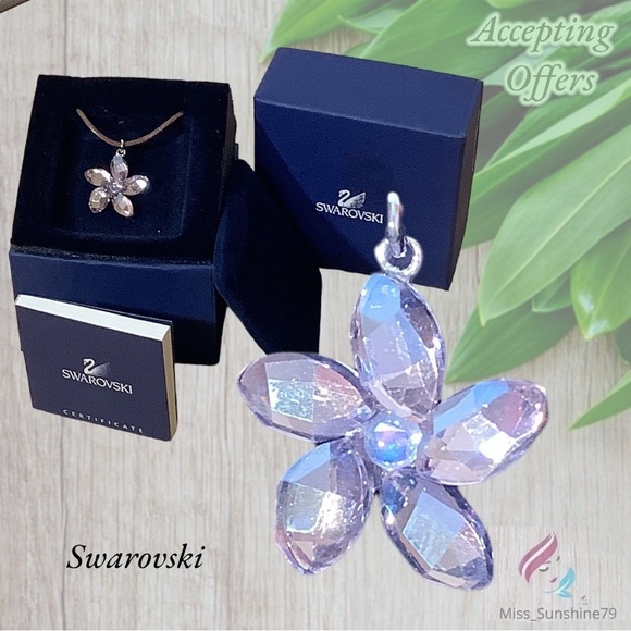 Jewelry - Swarovski - flower crystal char on a thin leather necklace - super cute 🥰